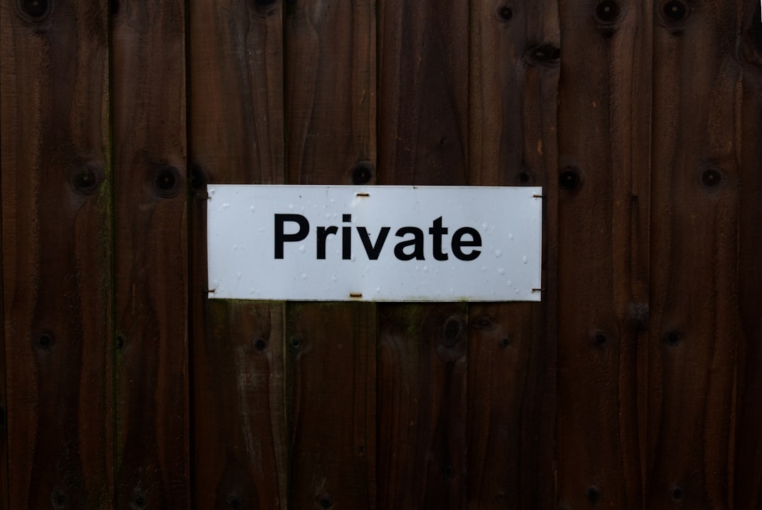 Private device holding a document on one side, public hash mark alone on the other